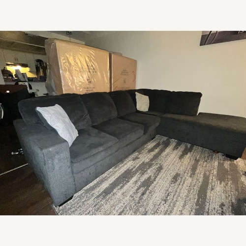 Used Ashley Furniture Dark Gray Fabric Sleeper Sofa for sale on AptDeco
