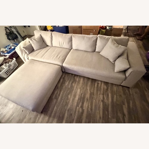 Used Simon Li Allsyn Gray Sectional Sofa w/Ottoman for sale on AptDeco