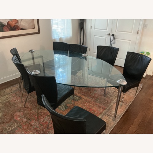 Used Cassina Dining Table and 8 Leather Chairs for sale on AptDeco