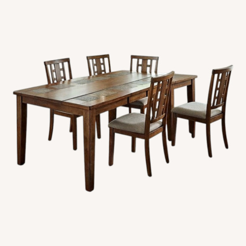 Used Ashley Tucker Dining Set ( Table + 6 Chairs) for sale on AptDeco