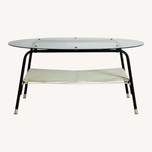 Used Vintage/Antique Finds Black Glass Coffee Table for sale on AptDeco