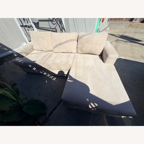 Used Living Spaces Natural Chaise Lounge for sale on AptDeco