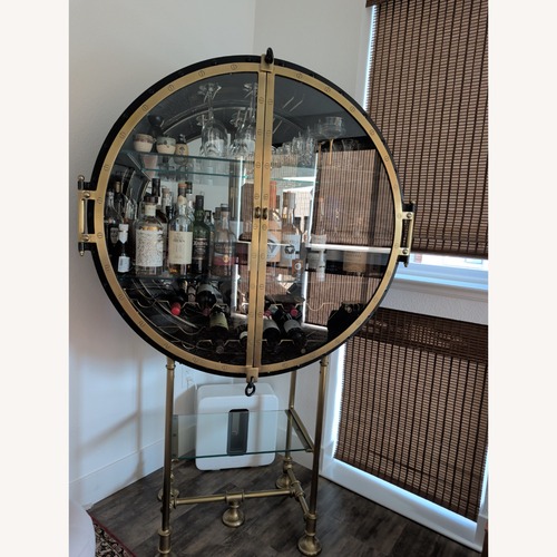 Used Restoration Hardware Porthole Bar Cabinet for sale on AptDeco