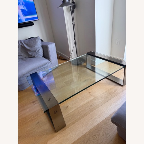 Used RH Glass & Stainless Steel Coffee Table for sale on AptDeco