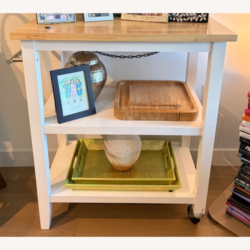Used Trinity Furniture White Wood Bar Cart for sale on AptDeco