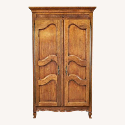 Used Light Brown Wood Armoire for sale on AptDeco