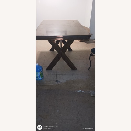 Used Ashley Dark Brown Wood Dining Table for sale on AptDeco