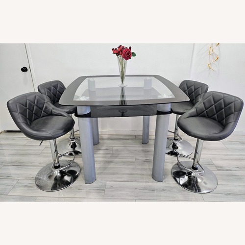 Used Tempered Glass Dining Table with Storage for sale on AptDeco