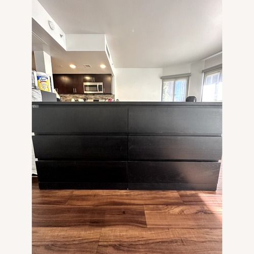 Used IKEA Malm Black Wood Dresser for sale on AptDeco