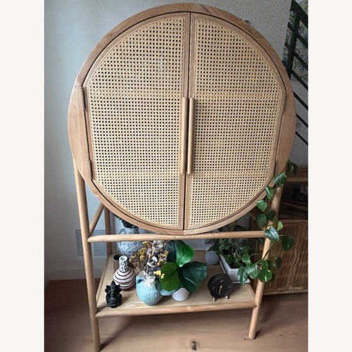 Used Crate & Barrel Retro Woven Rattan Accent Bar Cabinet for sale on AptDeco