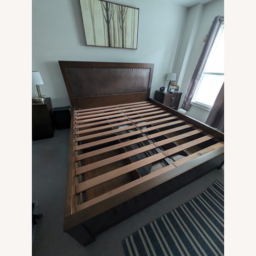 Used Arhaus King Size Bedframe With Under Bed Storage for sale on AptDeco