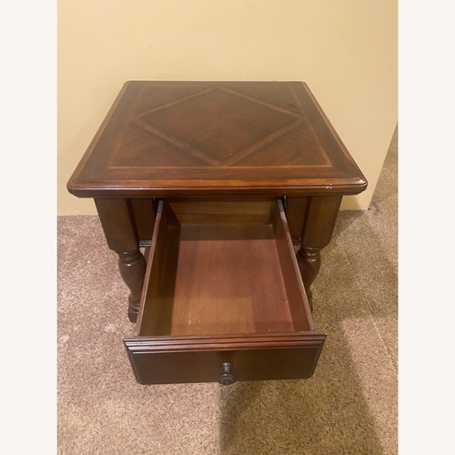 Used Ashley Furniture Farrell Dark Brown Wood Side Table for sale on AptDeco