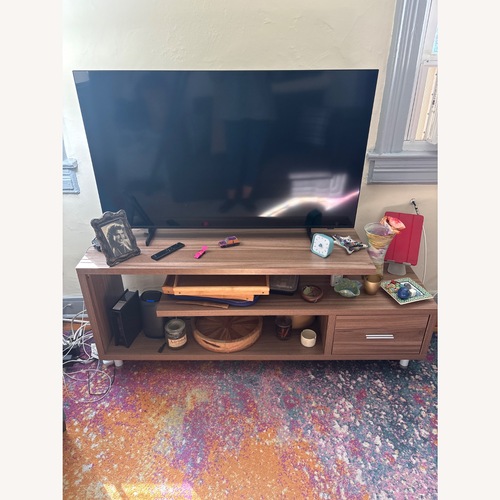 Used Overstock Light Brown Wood Media Storage for sale on AptDeco