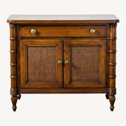 Used Wooden Cabinet with Cane-Panel Doors for sale on AptDeco