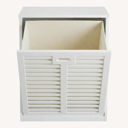 Used Tilt Out Laundry Hamper Cabinet for sale on AptDeco