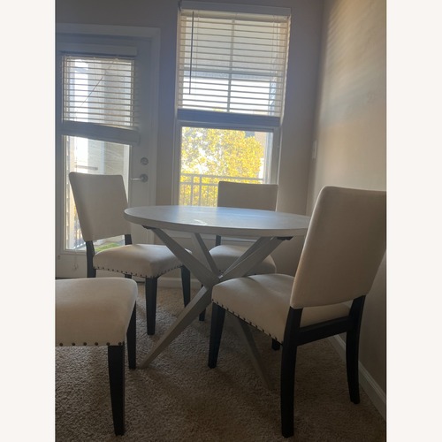 Used Cort Furniture Radcliffe Light Gray Wood Dining Chairs for sale on AptDeco
