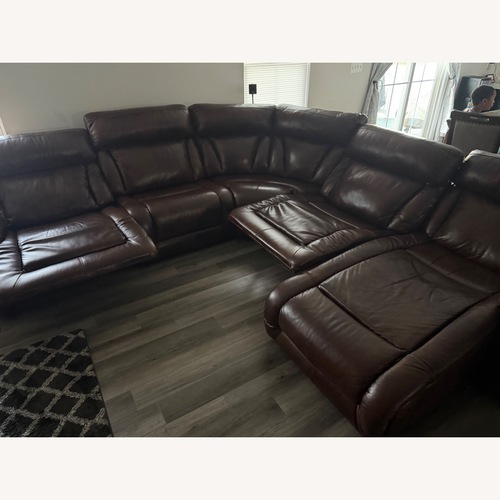 Used Dark Brown Leather 3+ Piece Sectional for sale on AptDeco