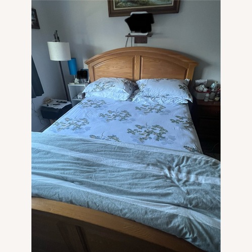 Used Natural Wood Queen Bed for sale on AptDeco