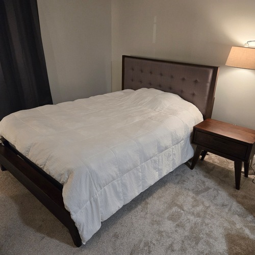 Used Macy's Ludwig Dark Brown Wood Queen Bed with Headboard for sale on AptDeco