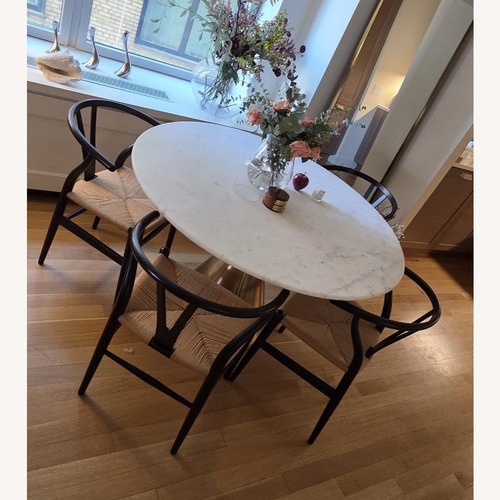 Used West Elm Silhouette Marble Round Dining Table for sale on AptDeco