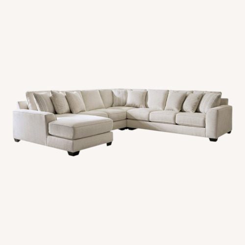 Used Ashley Furniture Lerenza Cream  Couch  for sale on AptDeco