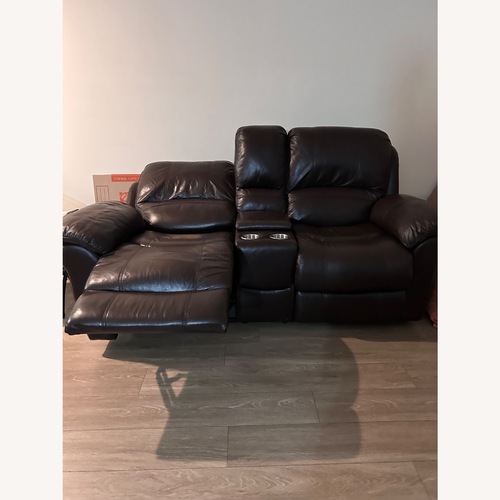Used Brown Leather Reclining Sofa for sale on AptDeco