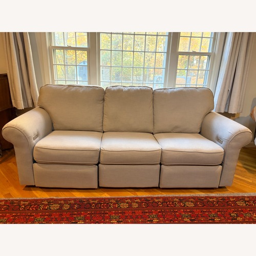 Used Sunbrella Fabric Reclining Sofa  for sale on AptDeco
