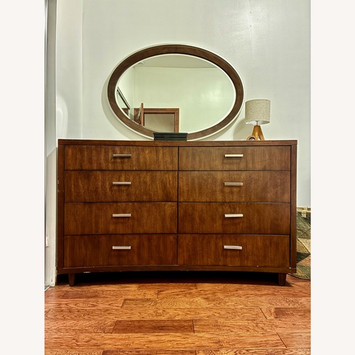 Used Fortunoff Dark Brown Wood Dresser with Oval Morror for sale on AptDeco