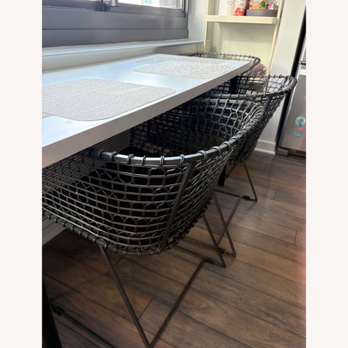 Used Crate & Barrel Black Metal Dining Chairs - Set of 4 for sale on AptDeco