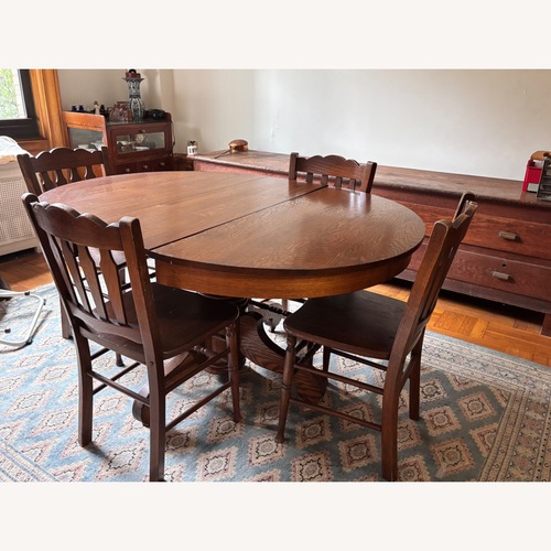 Used Vintage/Antique Dark Brown Dining Table for sale on AptDeco