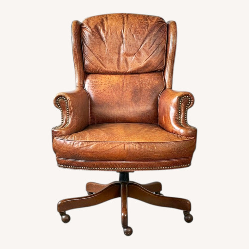 Used Vintage/Antique Dark Brown Leather Armchair for sale on AptDeco