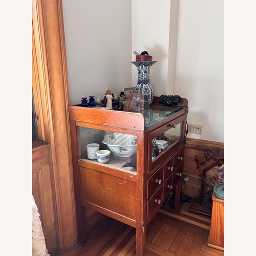 Used Vintage/Antique Dark Brown Wood Sideboard for sale on AptDeco