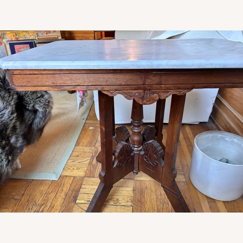 Used Vintage/Antique Dark Brown Wood Side Table for sale on AptDeco