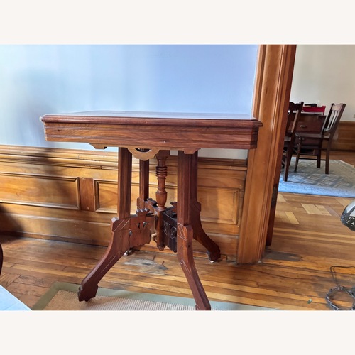 Used Vintage/Antique Dark Brown Wood Side Table for sale on AptDeco