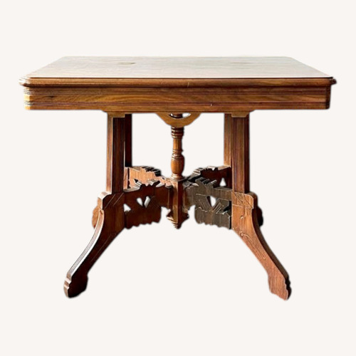 Used Vintage/Antique Dark Brown Wood Side Table for sale on AptDeco