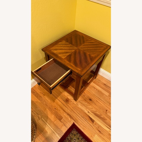 Used Living Spaces Dark Brown Wood Side Table for sale on AptDeco