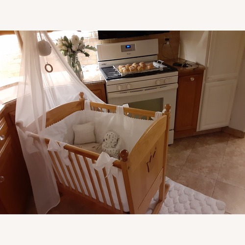 Used Jacadi Natural Wood Cradle with Canopy for sale on AptDeco