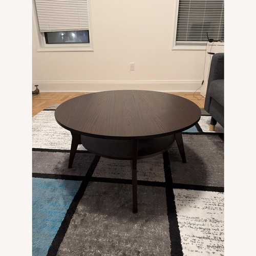 Used IKEA Dark Brown Wood Coffee Table for sale on AptDeco