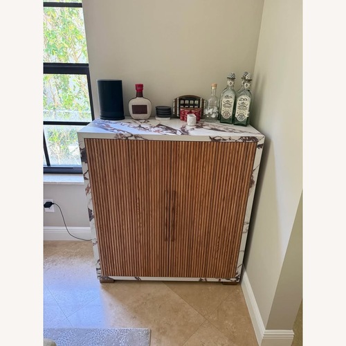 Used Wood and Marble Style Finish Bar Cart for sale on AptDeco