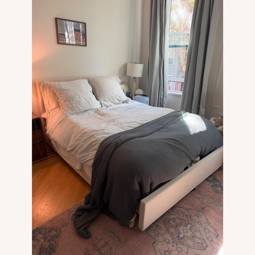 Used Natural Linen Full Sized Bed Frame with Storage for sale on AptDeco