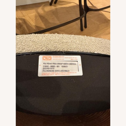 Used Poltrona Frau Archibald Swivel Dining Chair for sale on AptDeco