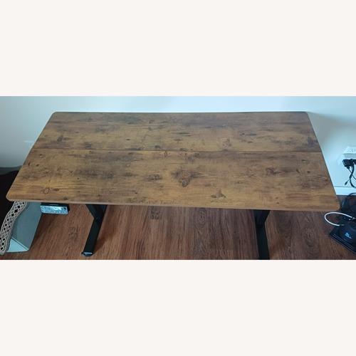 Used Electronic Height Adjusted Table With Wheels for sale on AptDeco