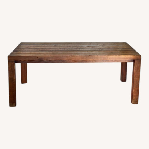 Used Dark Brown Wood Dining Table for sale on AptDeco