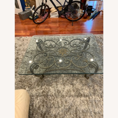 Used Glass and metal cocktail table. for sale on AptDeco