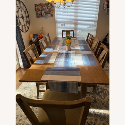 Used 8-Seater Solid Wood Dining Table with Chairs for sale on AptDeco
