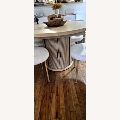 Used Natural Wood Dining Table and Chairs for sale on AptDeco