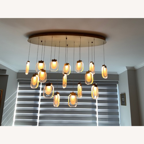 Used Modern Glass Chandelier for sale on AptDeco