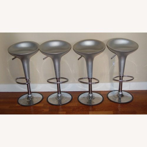 Used Four silver counter stools  for sale on AptDeco