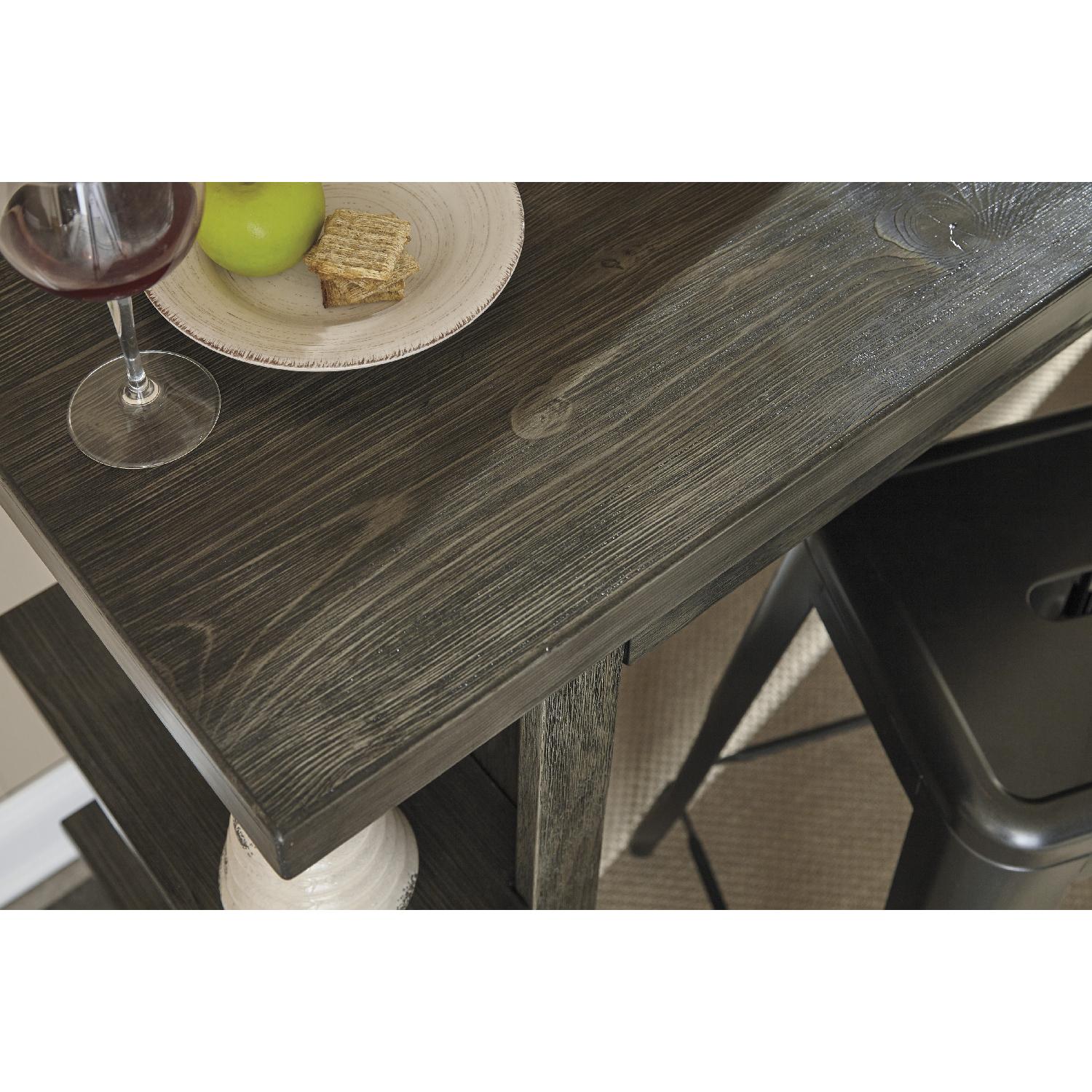 Ashley's Lamoille Long Counter Height Wooden Table w/ 4 Pinnadel Stools - image-2