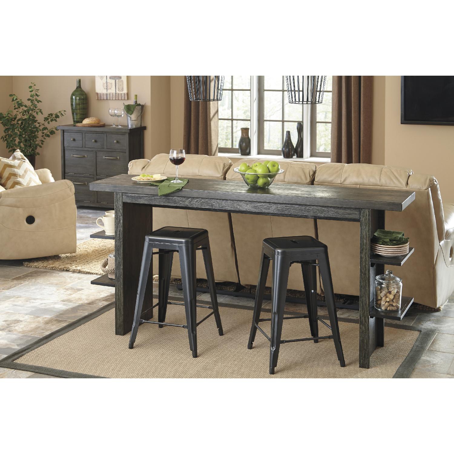 Ashley's Lamoille Long Counter Height Wooden Table w/ 4 Pinnadel Stools - image-6